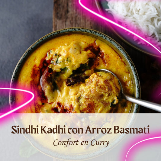 Sindhi Kadhi con Arroz Basmati_A comforting bowl of Sindhi Kadhi paired with fluffy basmati rice, combining aromatic spices with hearty vegetables in a rich curry sauce.