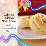 Delicate, buttery Naan Katai cookies topped with slivers of almonds, offering a sweet, melt-in-your-mouth taste of Indian dessert tradition.